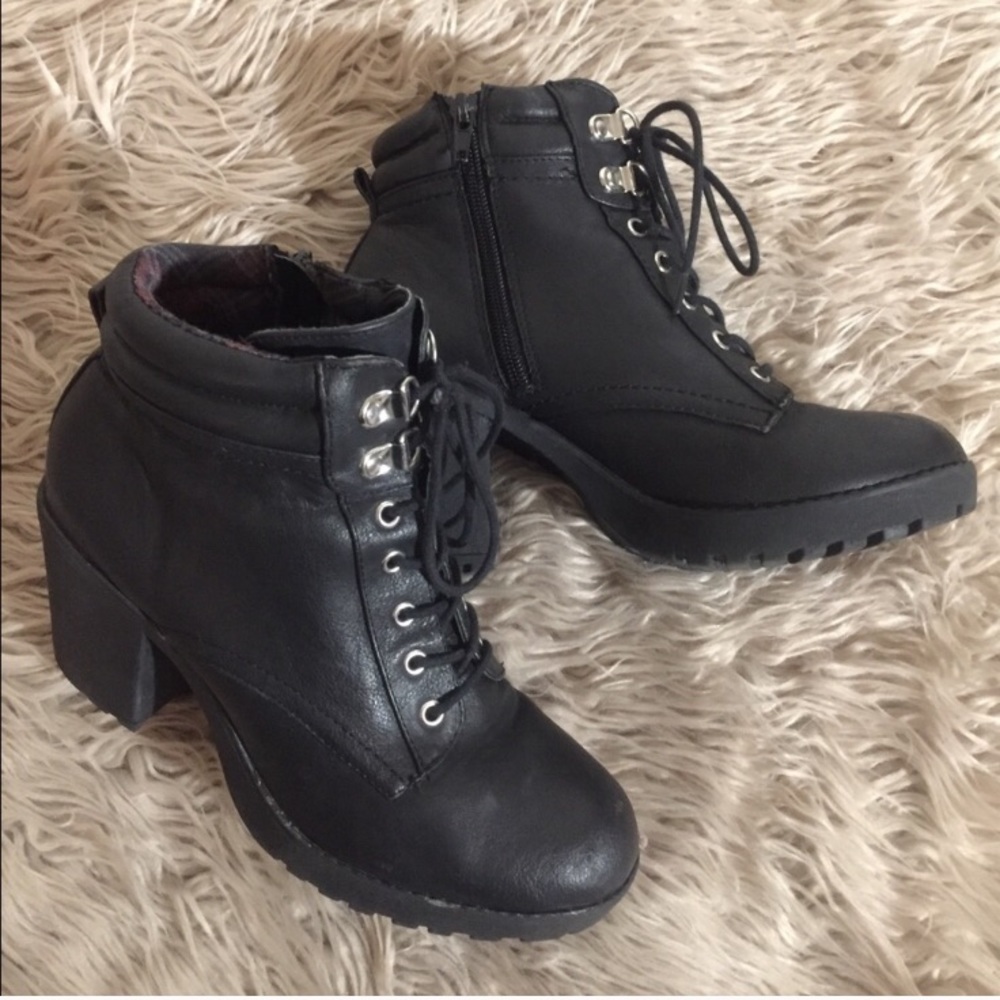Black zip-up combat style ankle boots